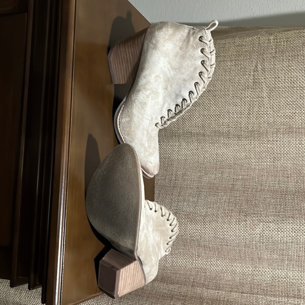Light tan booties never worn. Size 8